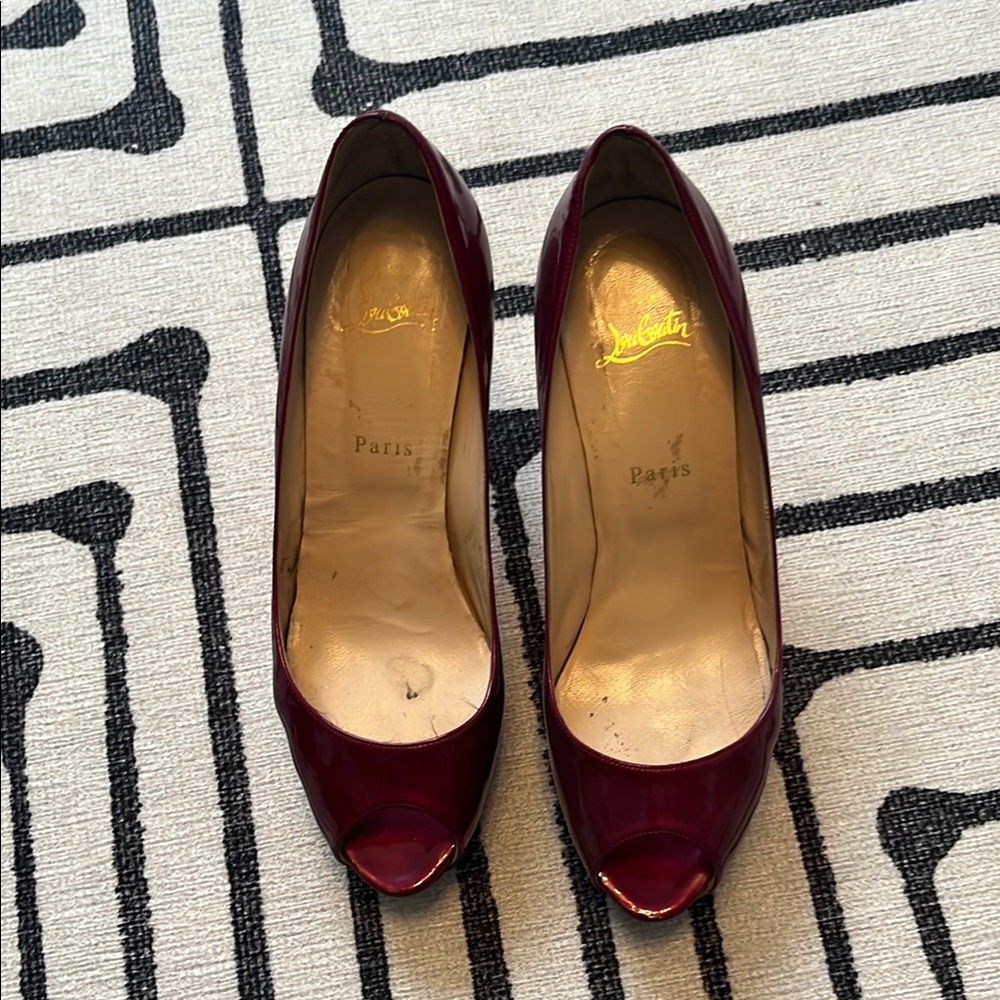 Christian Louboutin Red High Heels with Pointed Toe Design